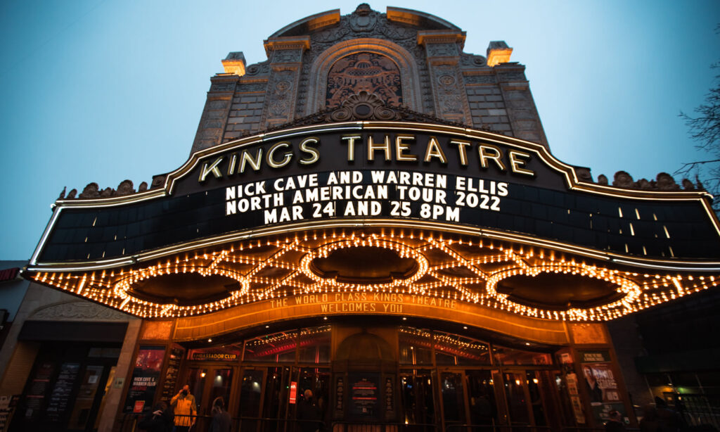 Illuminated front entrance of the Kings Theater
