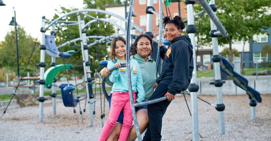 Children on the playground outside the Brettler Family Place.
