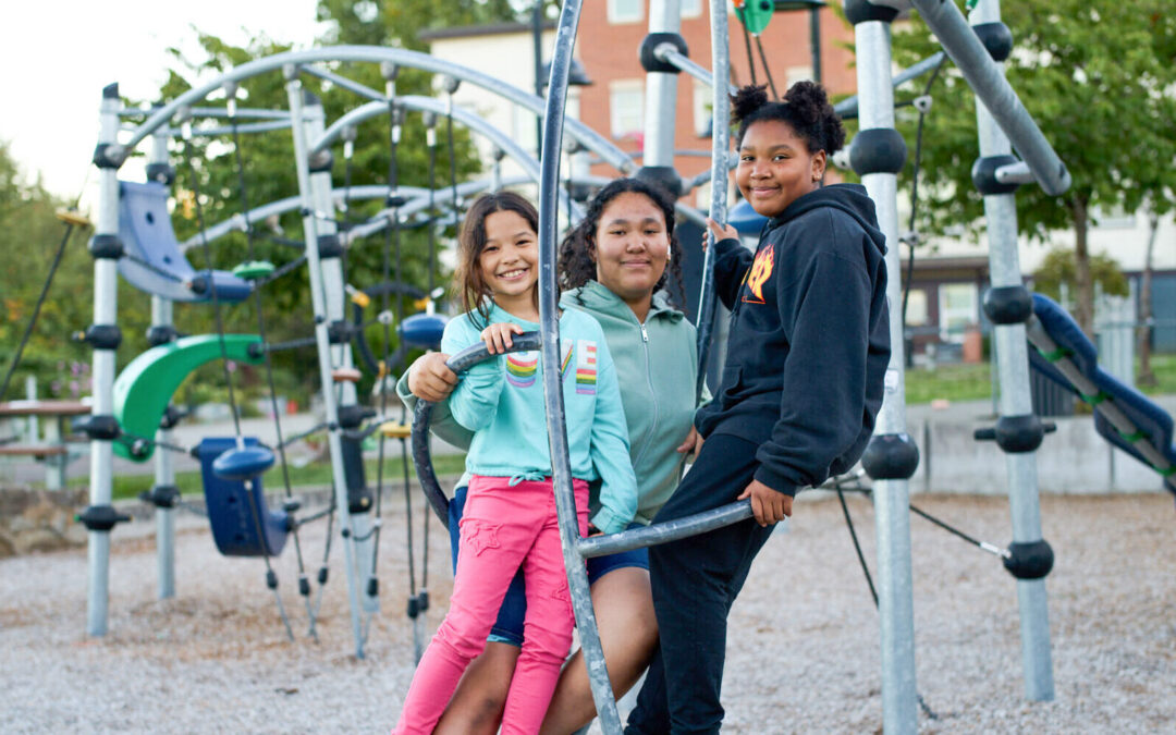 Children on the playground outside the Brettler Family Place.