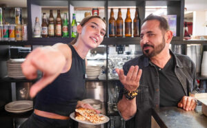 Sicilia Pizza owner, Amrol Hararah and fashion model Tiana Focazio © Jacob Alba