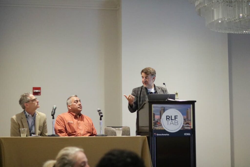 Brian Gibbs (Brian Gibbs Development) speaks at the workshop’s Developer Forum alongside Mike Grote (Alembic Community Development) and Peter Aamodt (Elysium Development)