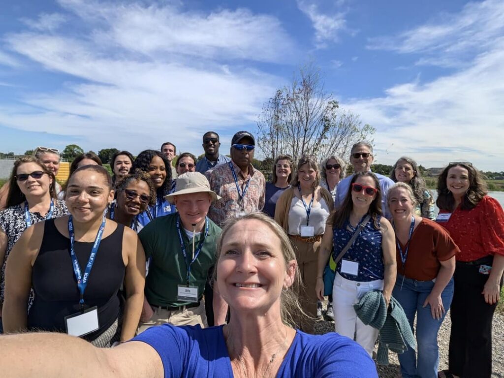 Group photo during the mobile workshop stop at the Naval Support Activity (NSA) Complex site